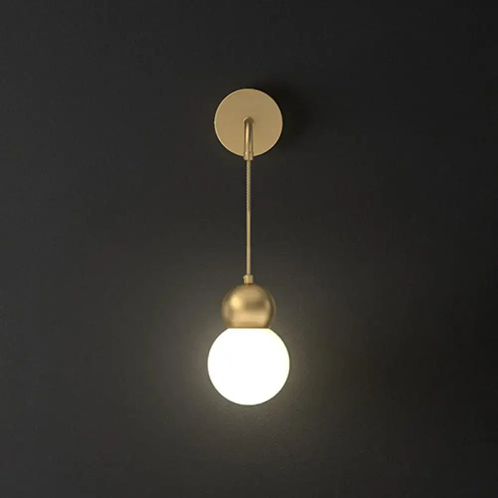 Modern gold sconce light with milky glass – bedroom wall lamp