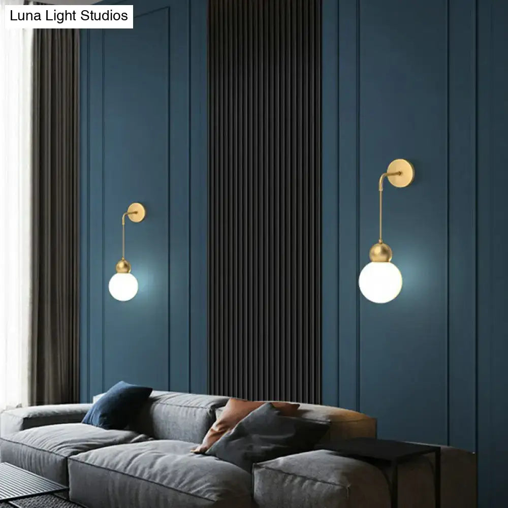 Modern gold sconce light with milky glass – bedroom wall lamp