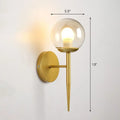 Modern gold torch wall sconce with clear glass globe and slender stem compatible with e26 e27 bulbs for corridor lighting