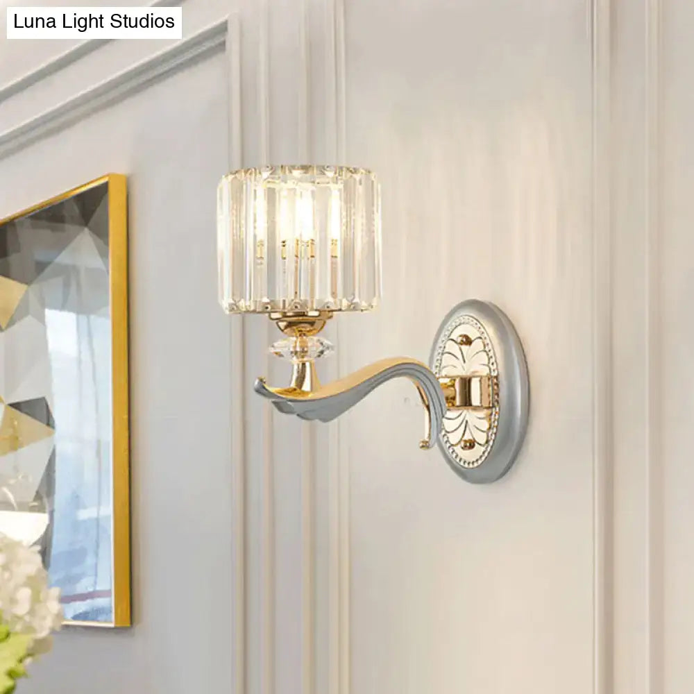 Modern gold wall light with clear crystal shade – living room sconce
