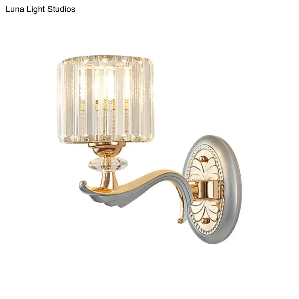 Modern gold wall light with clear crystal shade – living room sconce