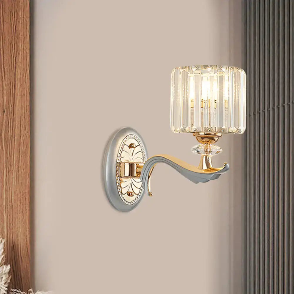 Modern gold wall light with clear crystal shade – living room sconce