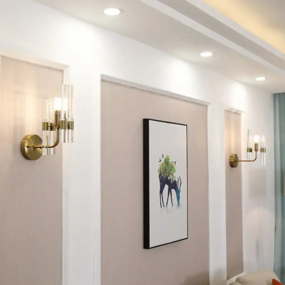 Modern gold wall sconce with clear crystal pipe for hallway