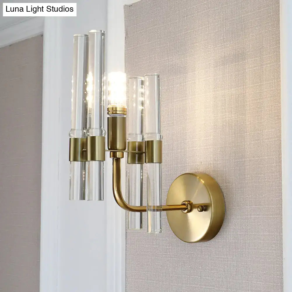Modern gold wall sconce with clear crystal pipe for hallway