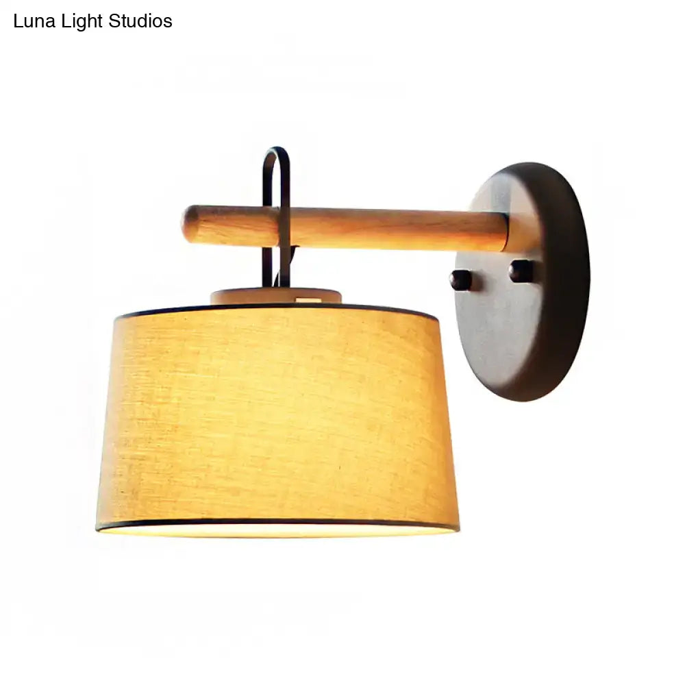 Modern grey drum shade wall lamp with wood arm for bedroom lighting