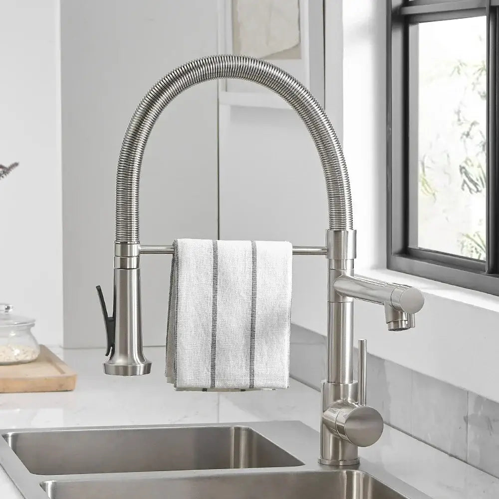 Modern matte black and brushed nickel spring kitchen faucet