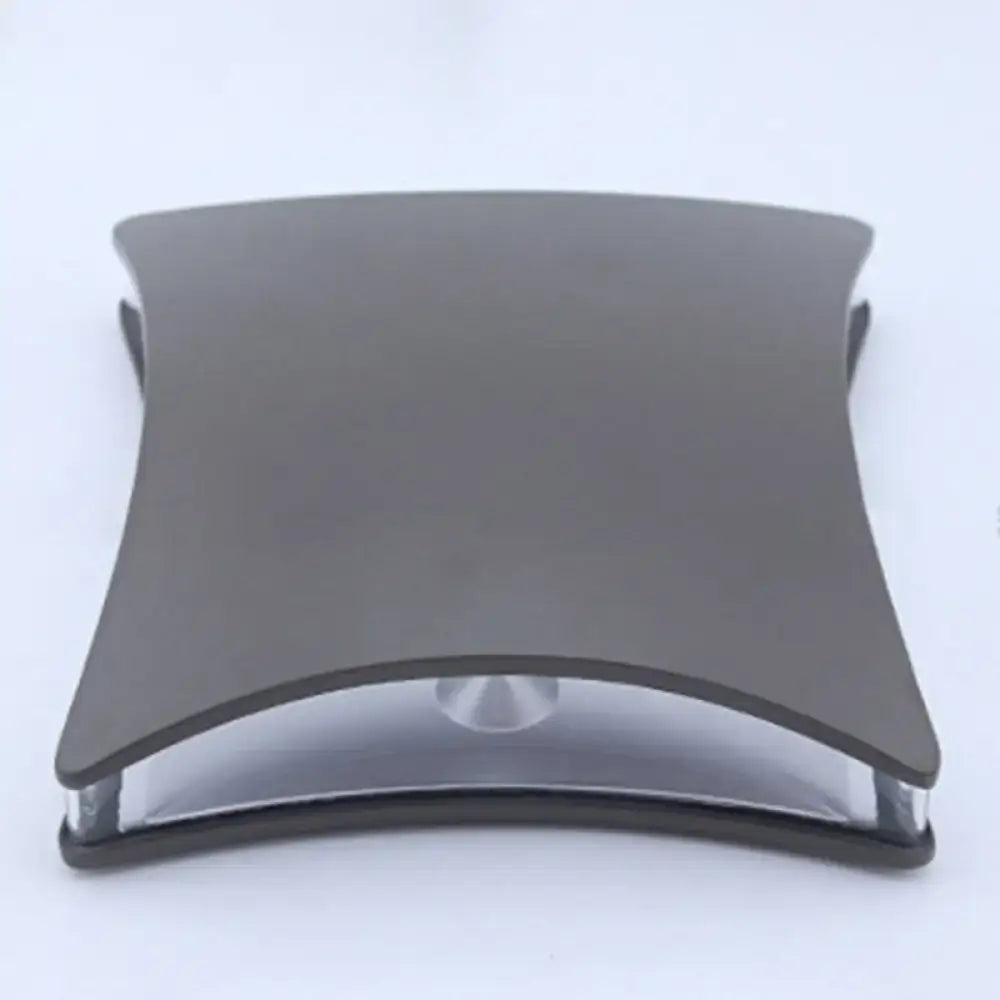 Modern matte black curved desk lamp with glass accent for bedroom