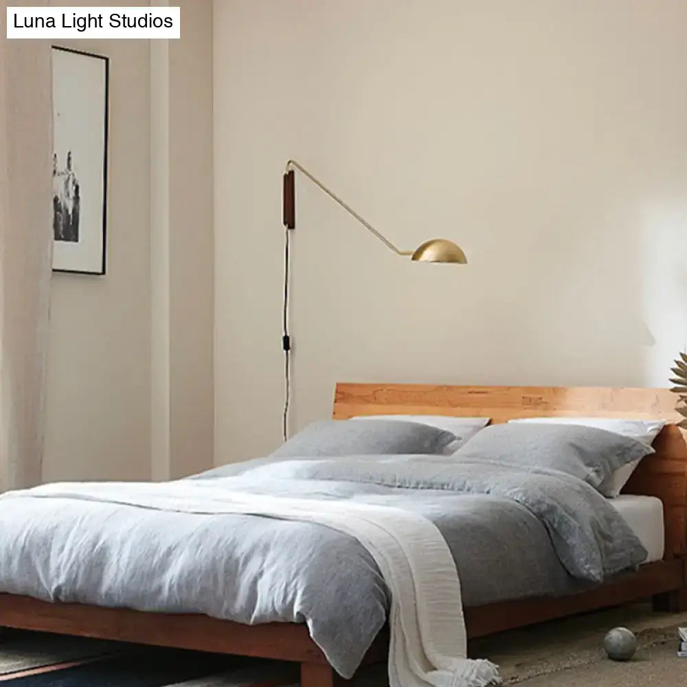 Modern matte black swing arm bedside wall lamp with wood accent bedroom