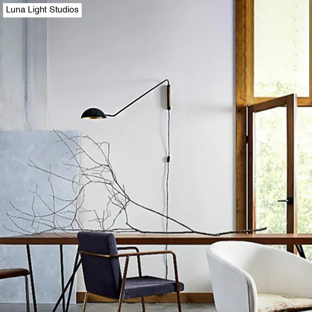 Modern matte black swing arm bedside wall lamp with wood accent bedroom