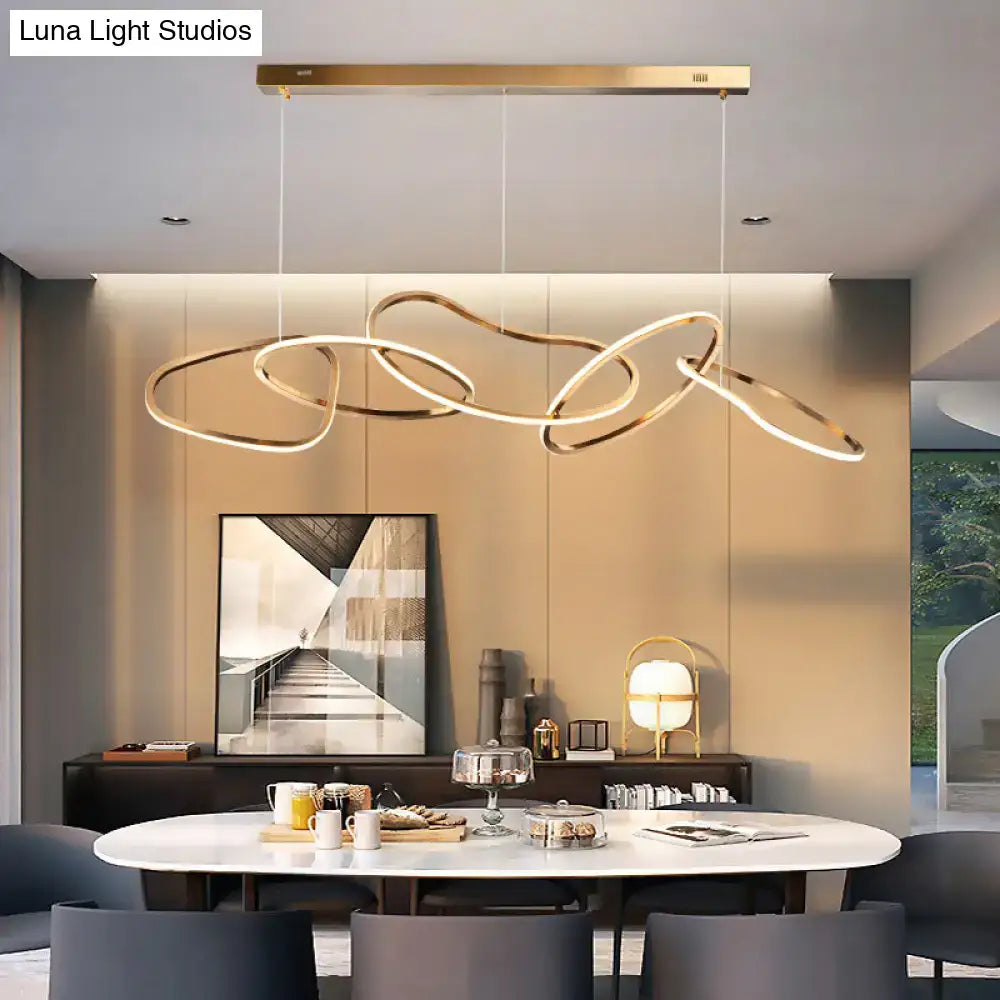 Modern minimalist golden led hanging light featuring gold-toned interlocking rings with a sleek rectangular ceiling mount