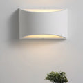 Modern minimalist white gypsum sconce lamp with curved fixture width and led bulb base for bedroom wall light