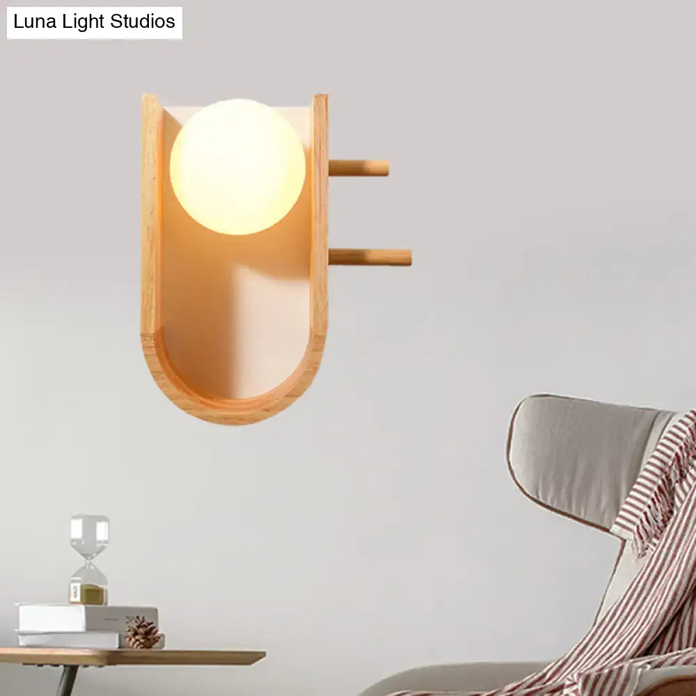 Modern minimalist wooden sconce light with hanging pegs for bedroom