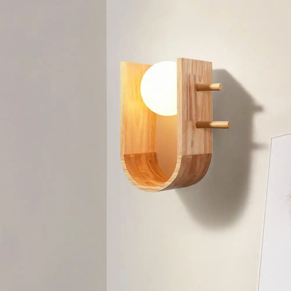 Modern minimalist wooden sconce light with hanging pegs for bedroom