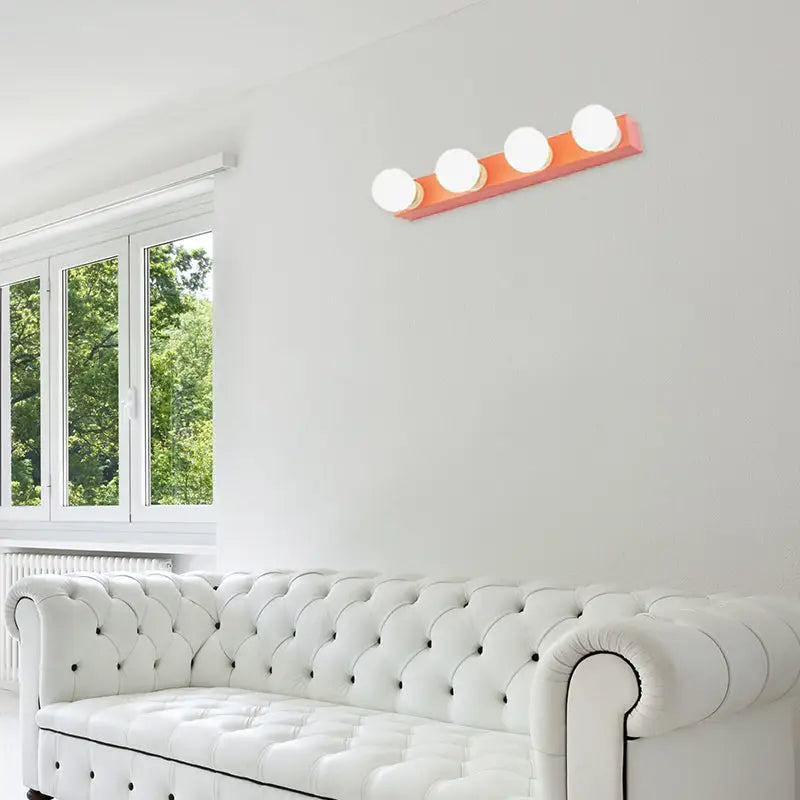 Modern orange & white 3 bulb vanity light fixture for bedroom