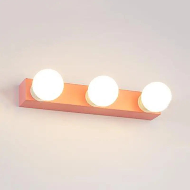 Modern orange & white 3 bulb vanity light fixture for bedroom