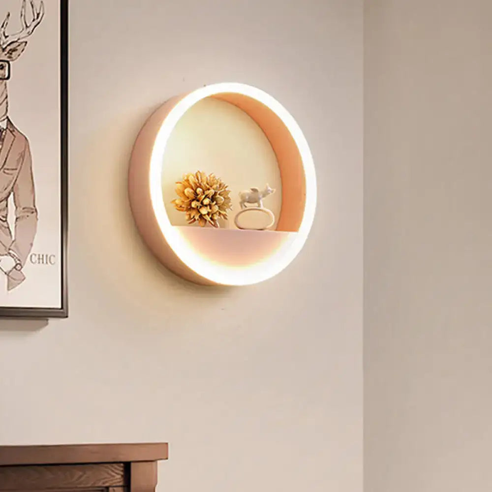 Modern pink & blue iron hoop wall light with bedroom storage rack
