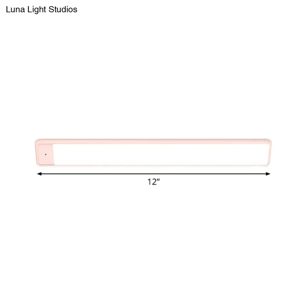Modern pink elongated vanity lighting fixture for bedroom