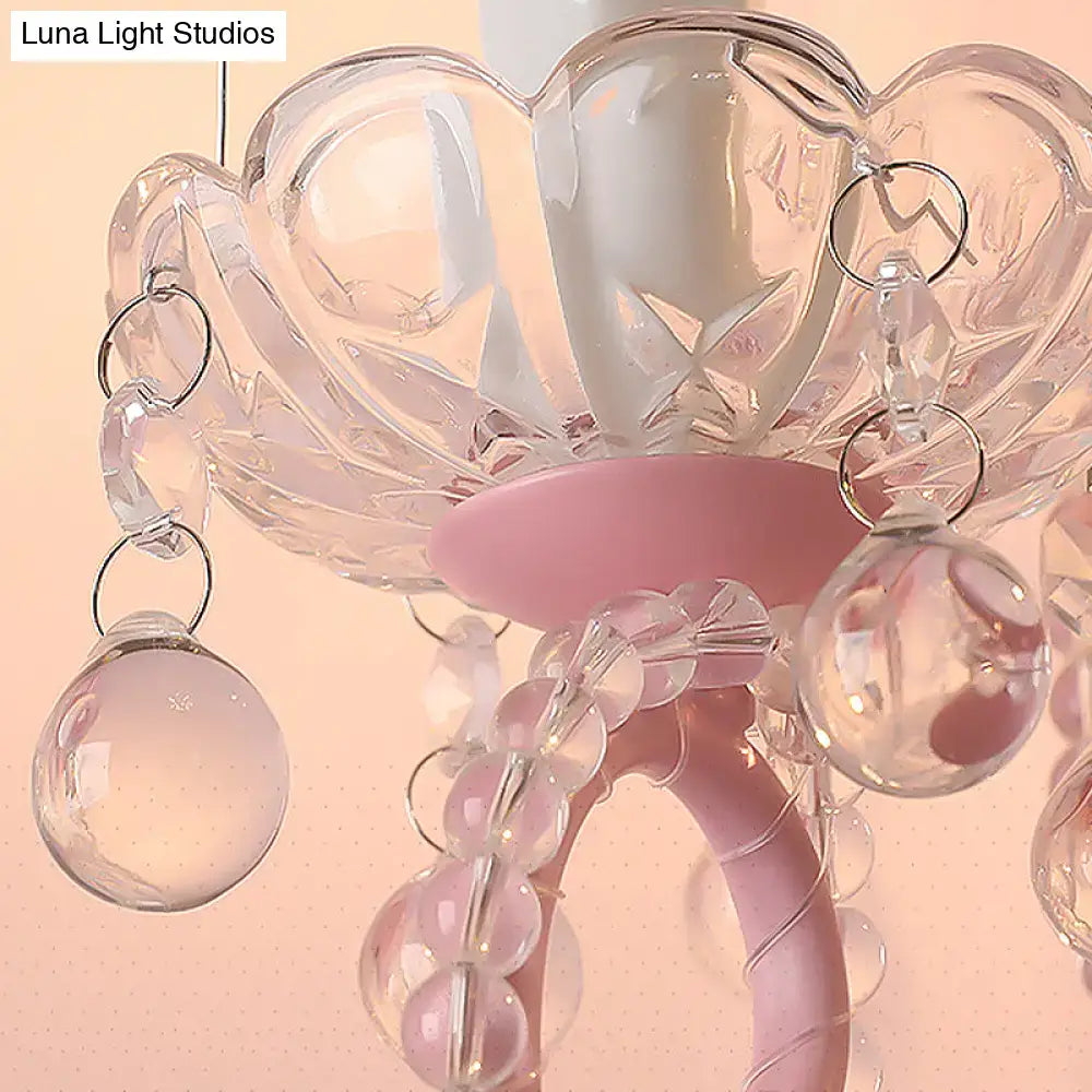 Modern pink metallic scroll arm wall lamp with crystal bedroom sconce