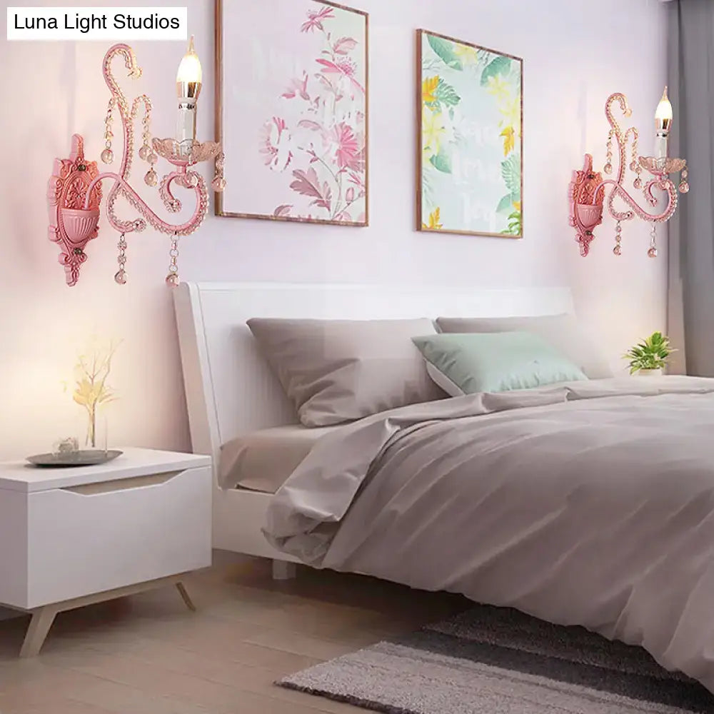 Modern pink metallic scroll arm wall lamp with crystal bedroom sconce