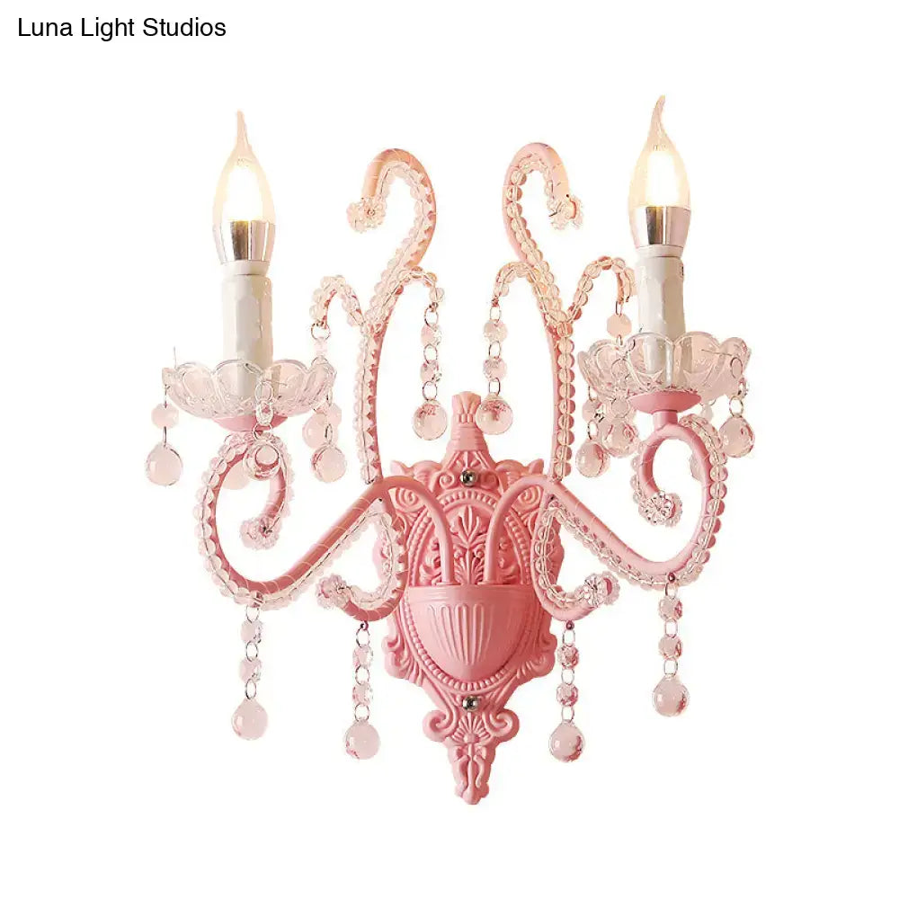 Modern pink metallic scroll arm wall lamp with crystal bedroom sconce