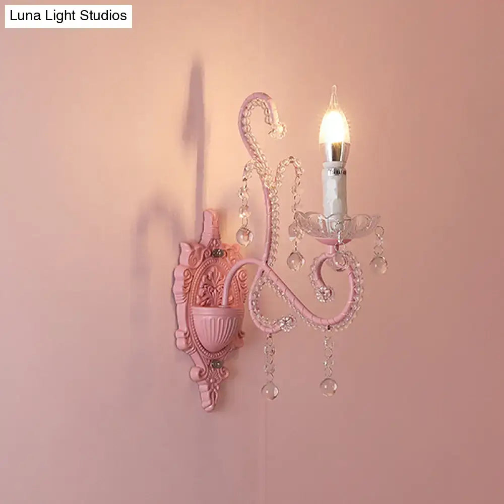 Modern pink metallic scroll arm wall lamp with crystal bedroom sconce