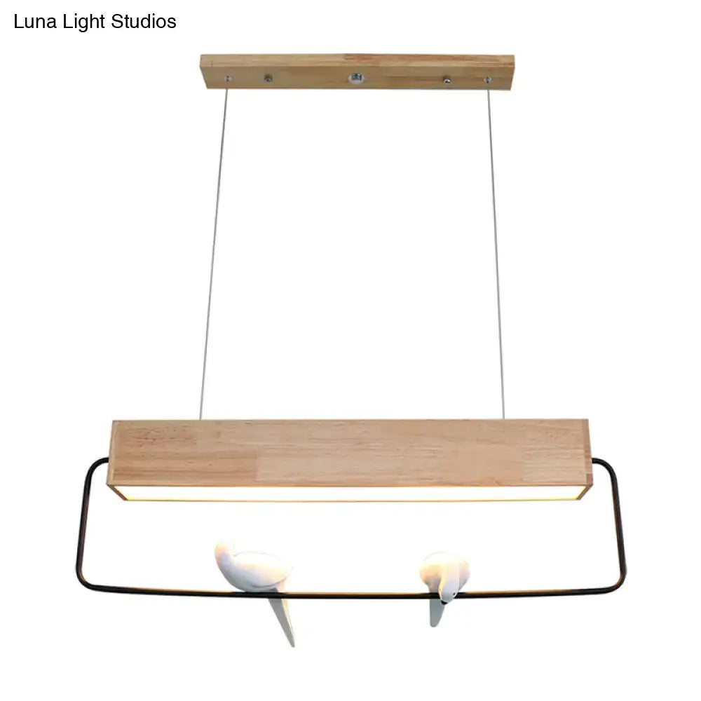 Modern rectangular wood and metal pendant light with birds dining room