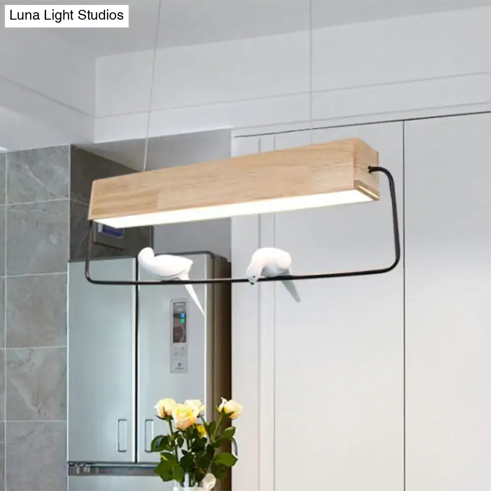 Modern rectangular wood and metal pendant light with birds dining room