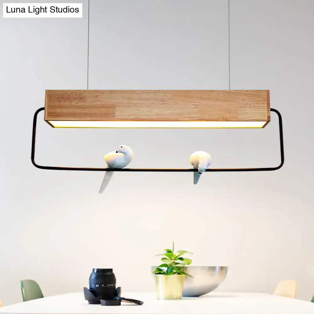 Modern rectangular wood and metal pendant light with birds dining room