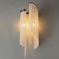 Modern silver crystal tassel wall light with cascading clear beads and curved chrome fixture for living room wall light