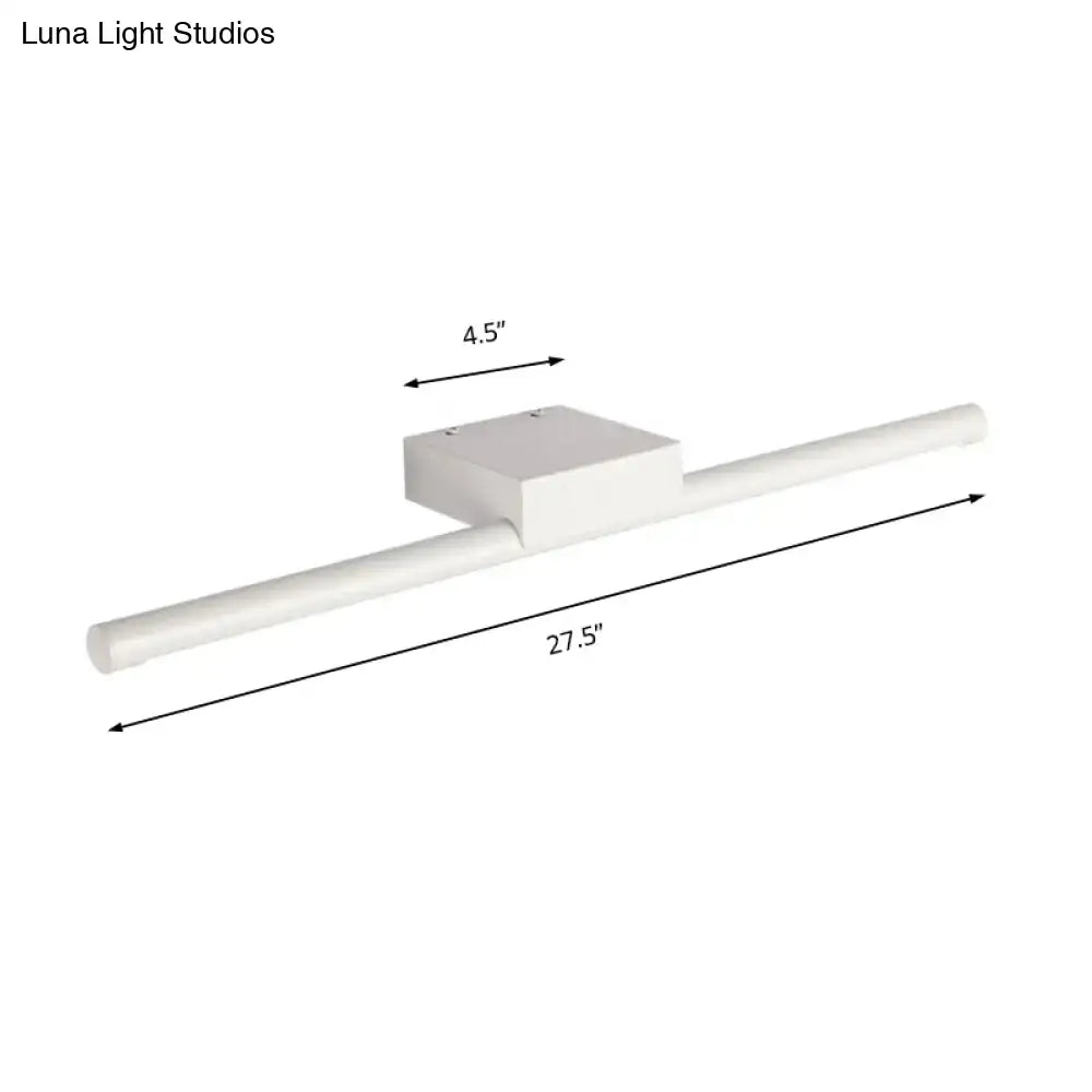 White rectangular wall-mounted light fixture with modern slim design and warm light for bathroom use 27.5 by 4.5 inches