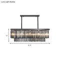 Modern smoke gray crystal rectangle chandelier with sleek black metal frame and cascading gray crystal blocks for dining room light