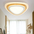Modern DecorBites™ kids room LED flush mount ceiling light with warm wood trim and soft white acrylic diffuser