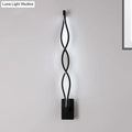 Modern twisted black led wall sconce with sleek design for bedroom lighting as a stylish led wall fixture