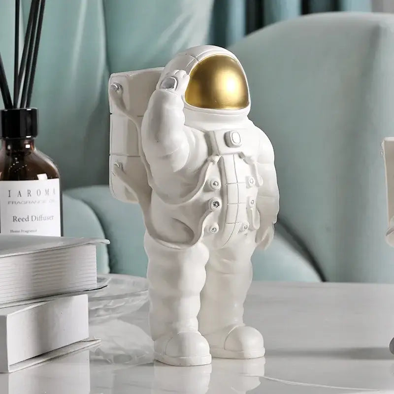 Modern white and gold astronaut phone holder living room figurine