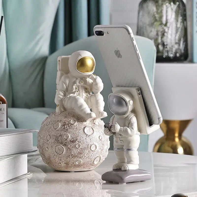 Modern white and gold astronaut phone holder living room figurine
