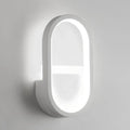 Modern white elliptical led wall lamp featuring a sleek oval design with soft glowing illumination for bedrooms
