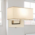 Modern white fabric wall sconce with cream fabric shade and polished brass frame for bedroom wall light