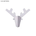 Modern white geometric reindeer wall lamp with angular antlers and minimalist design for bedroom light type use