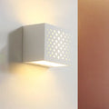 Modern white laser cut cube wall light with circular cutouts gypsum sconce for bedroom lighting