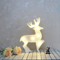 Modern white led reindeer nightstand light with glowing silhouette and remote control as a christmas element