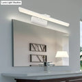 Modern white metallic cylinder vanity lamp with sleek minimalist design and led bathroom mirror light features