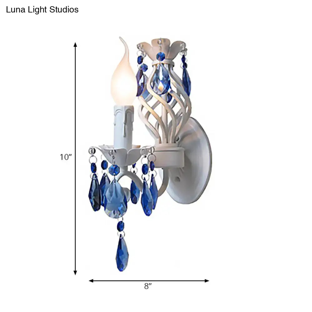 Modern white wall light with blue crystal draping bedroom sconce