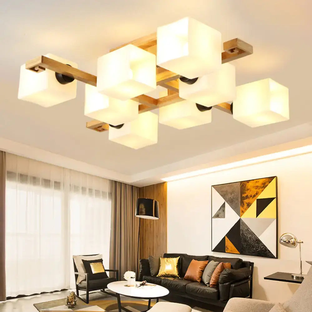 Modern geometric ceiling light with white glass cubes and wood canopy for living room lighting by decorbites