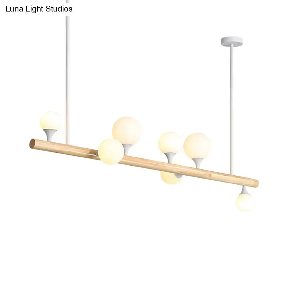 Modern wood island lamp with five globe lights dining room