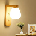 Modern wooden wall lamp with warm-toned wood fixture and frosted milky glass globe shade for 220v-240v use
