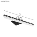 Modernist black white led vanity light with curved arm, sleek white diffuser, and black diamond-patterned trim for natural light