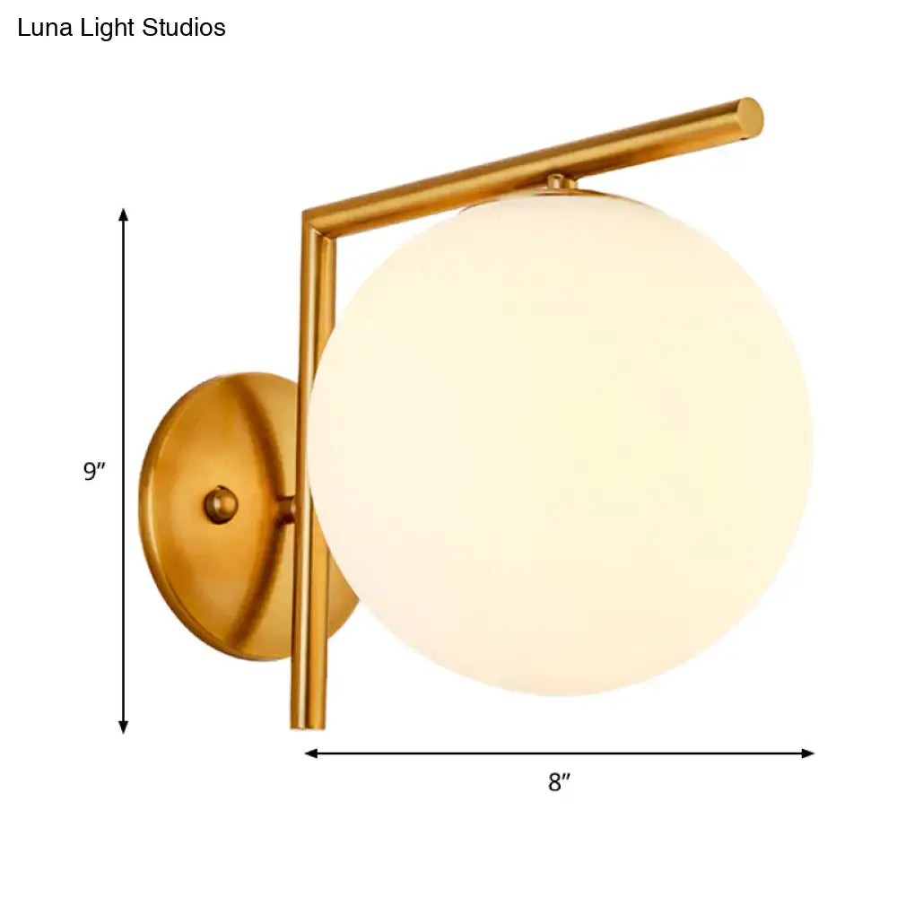Modernist gold and white globe sconce light – bedroom wall lamp