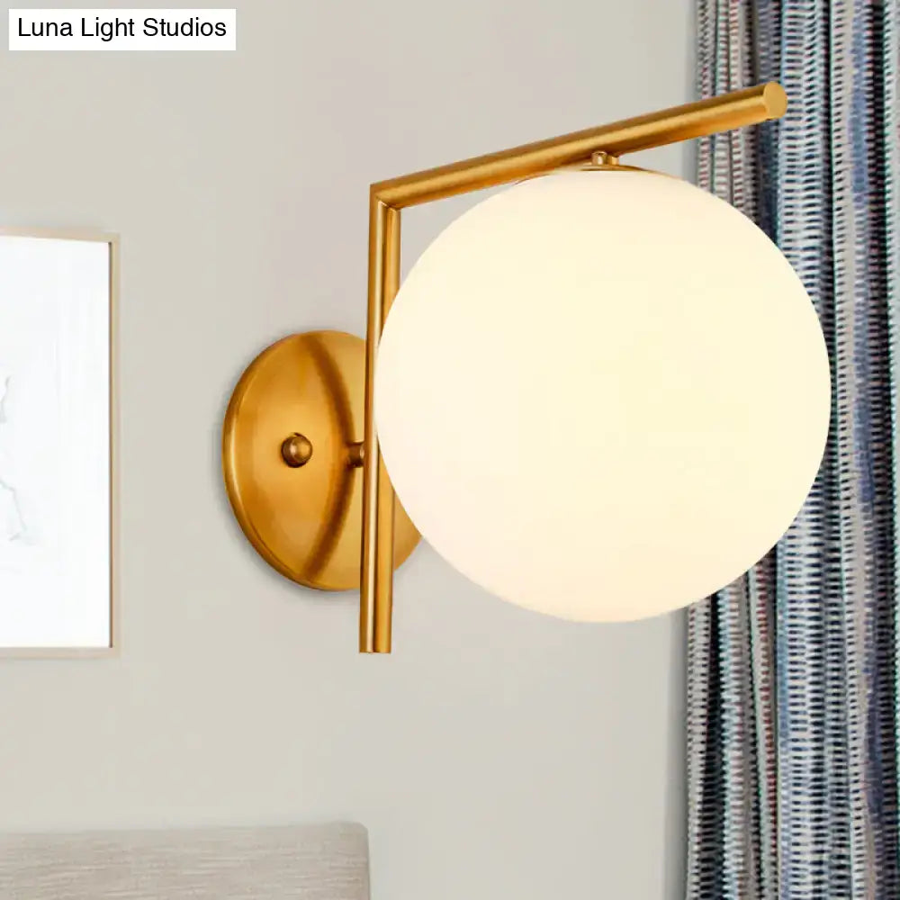 Modernist gold and white globe sconce light – bedroom wall lamp