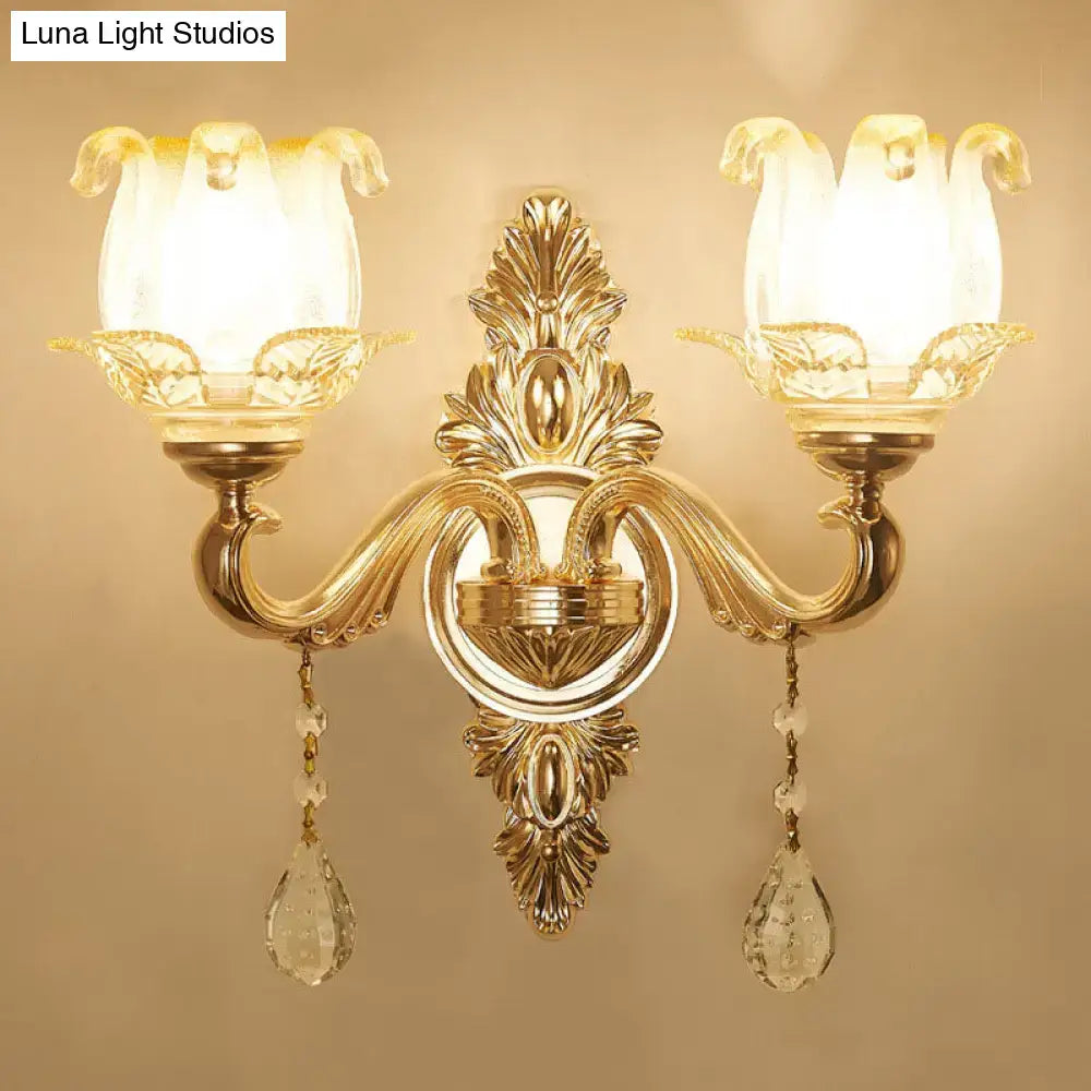 Modernist gold wall sconce with glass shade living room light