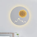 Nordic black white grey wall light fixture with textured golden sphere and minimalist mountain silhouette for bedroom use